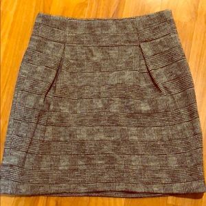 Pleated front grey and black plaid skirt